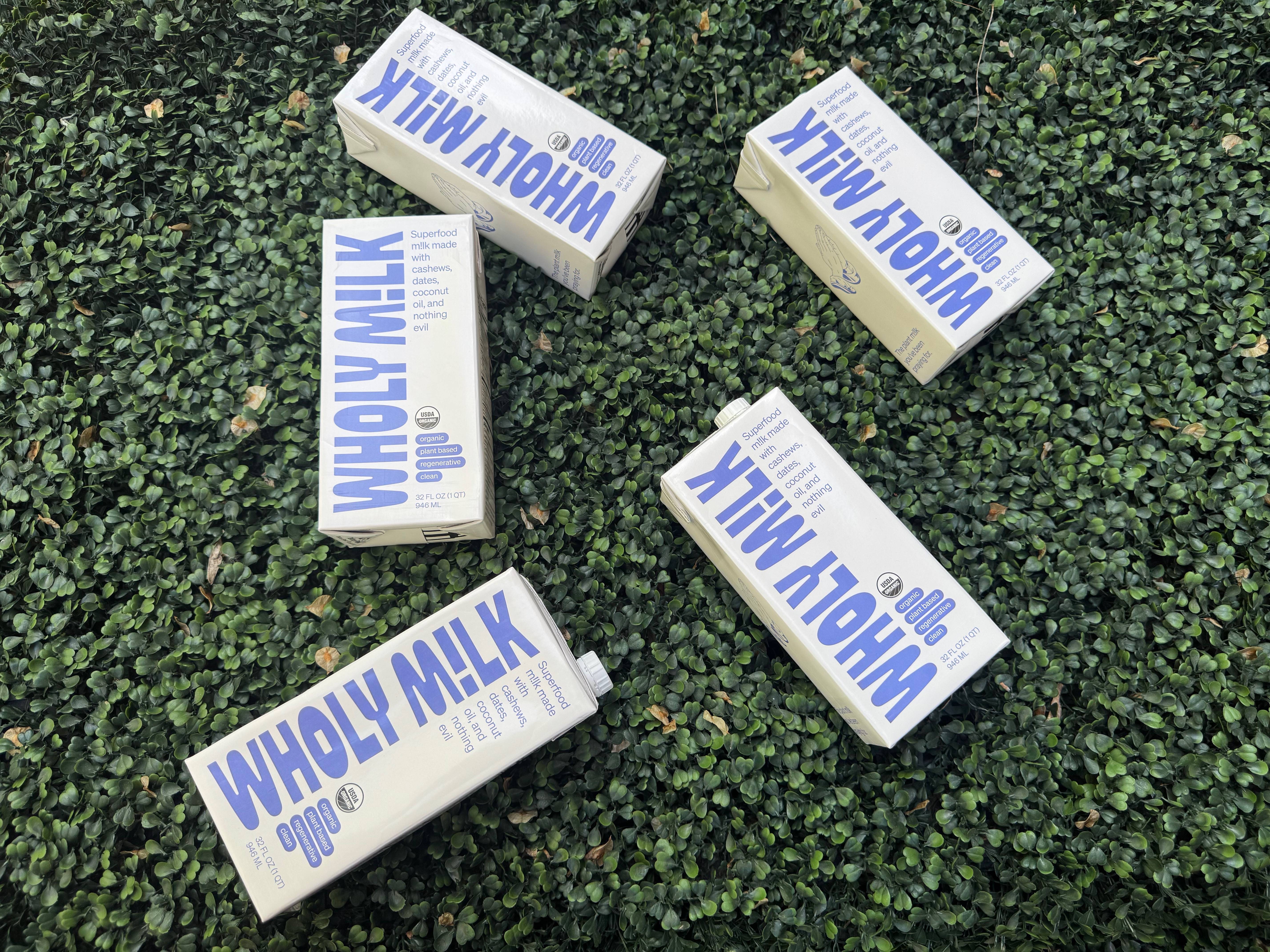 Wholy Milk cartons on grass